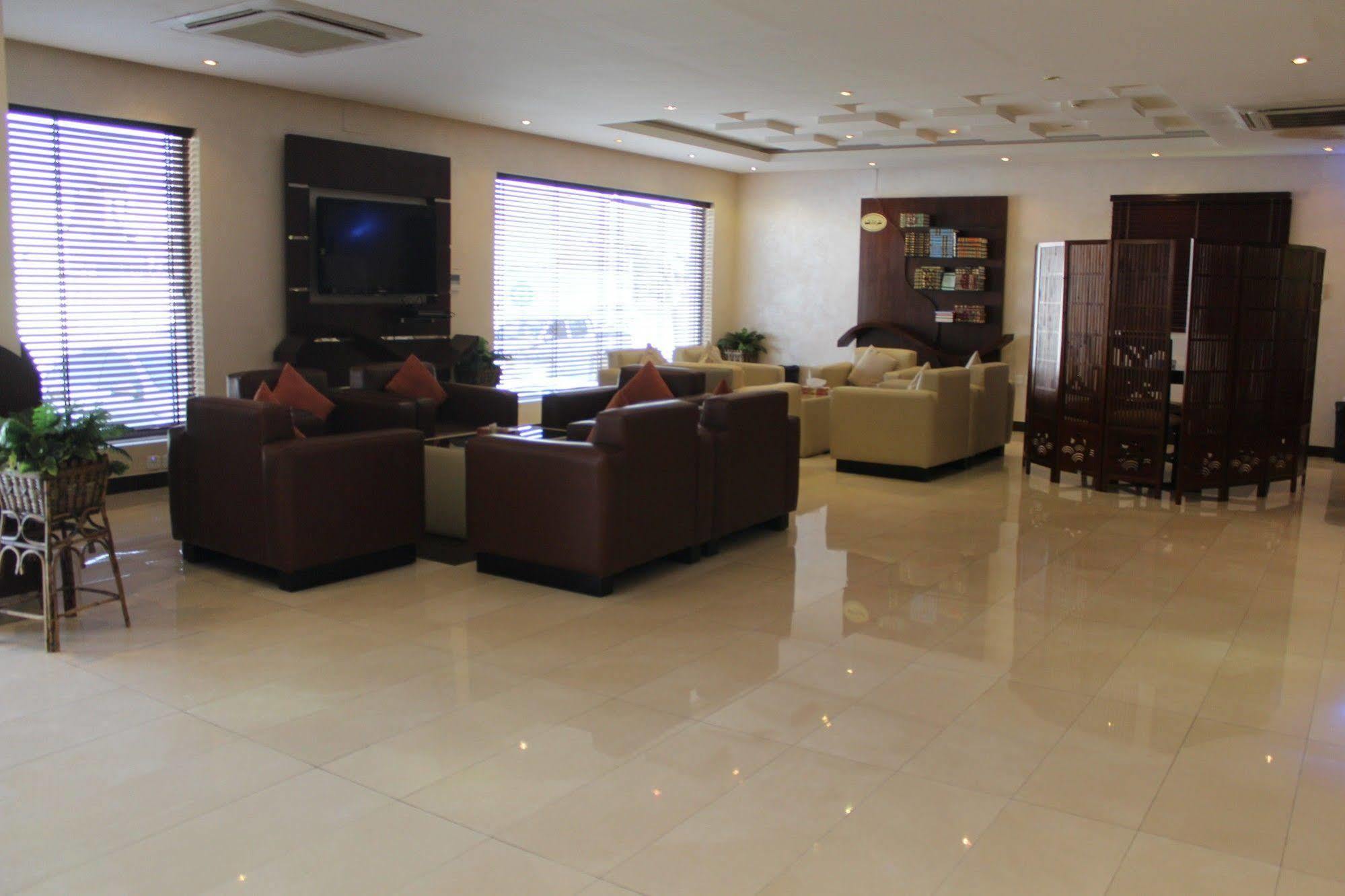 Merfal Hotel Apartments Al Taawan Рияд Екстериор снимка